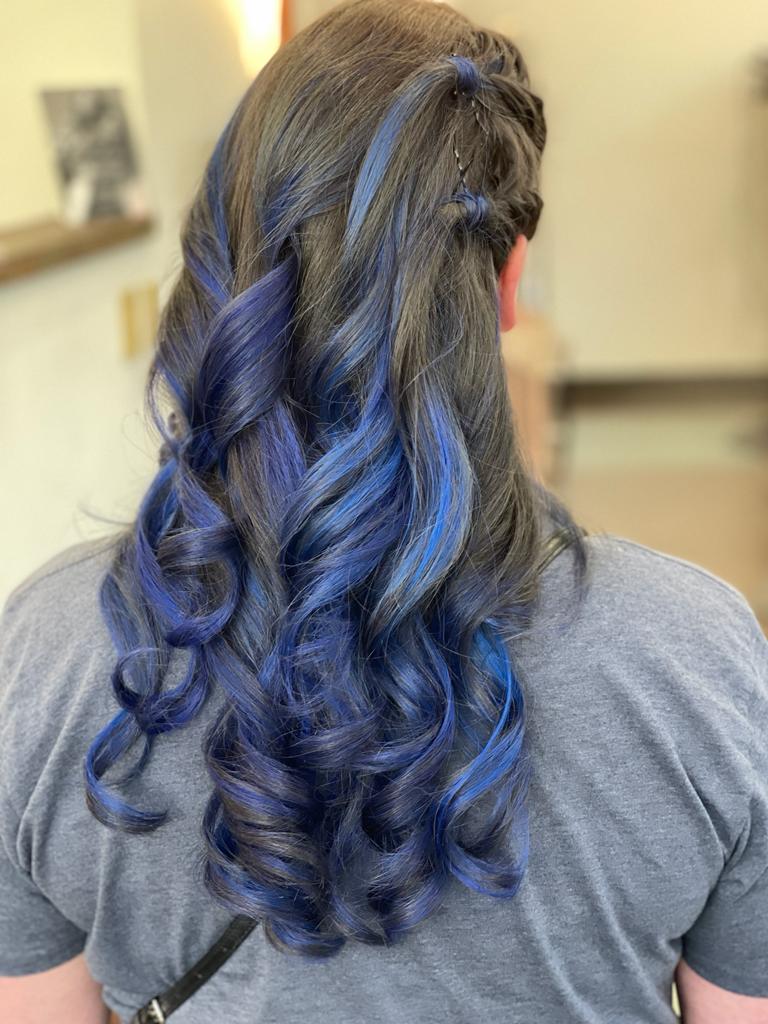 Bold and bright blue hair color created with vegan hair dye at Bijal Beauty Salon