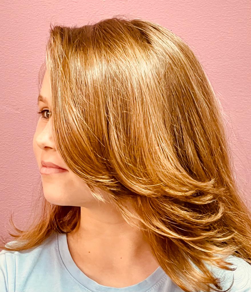 Layered haircut for long hair, styled with vegan hair products at Bijal Beauty Salon