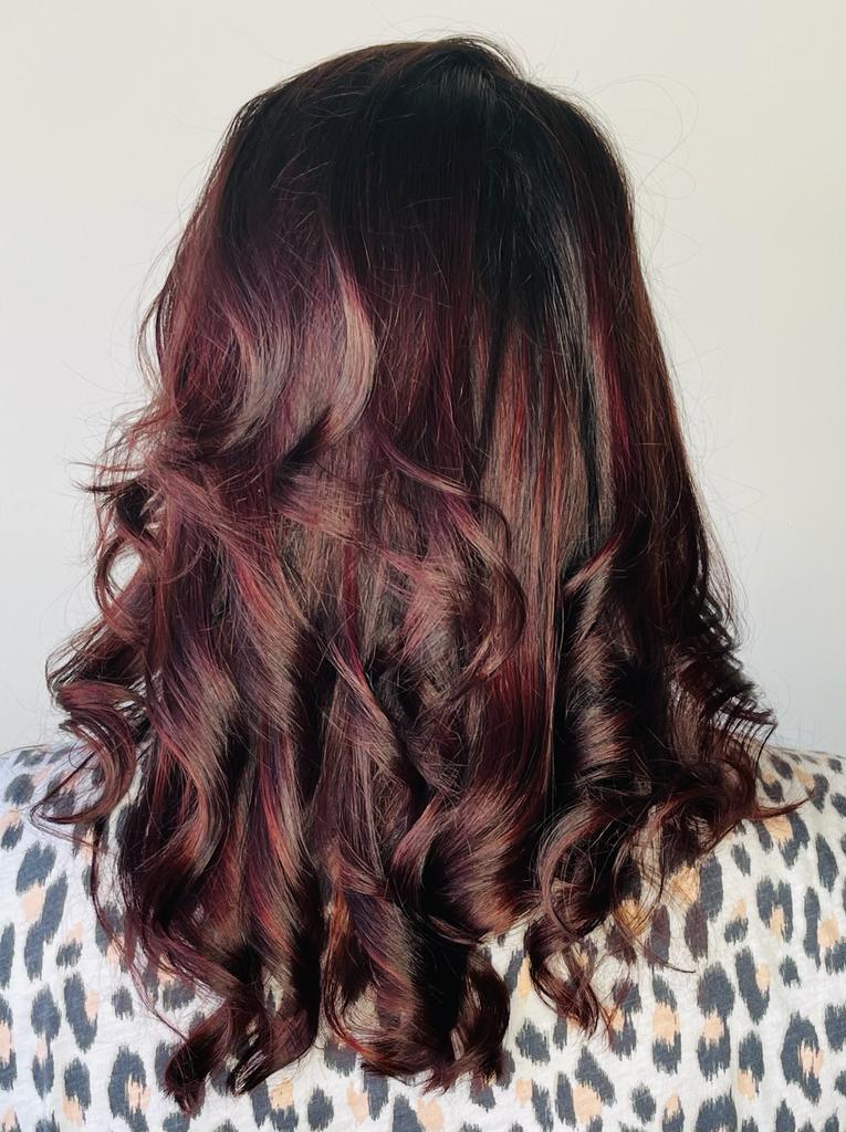 Vibrant red vegan hair color transformation by Bijal Beauty Salon