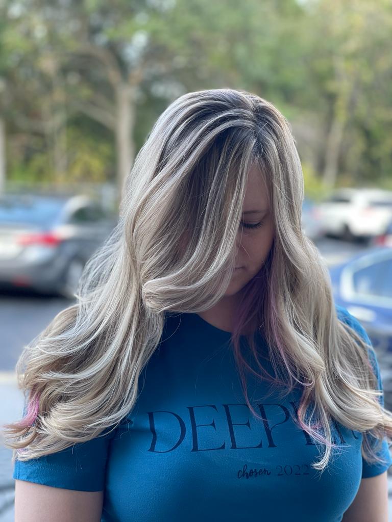 Long, wavy hair styled with cruelty-free hair products at Bijal Beauty Salon